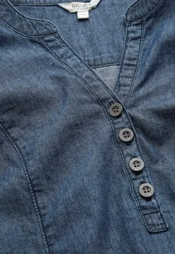 Denimtunika taskuilla