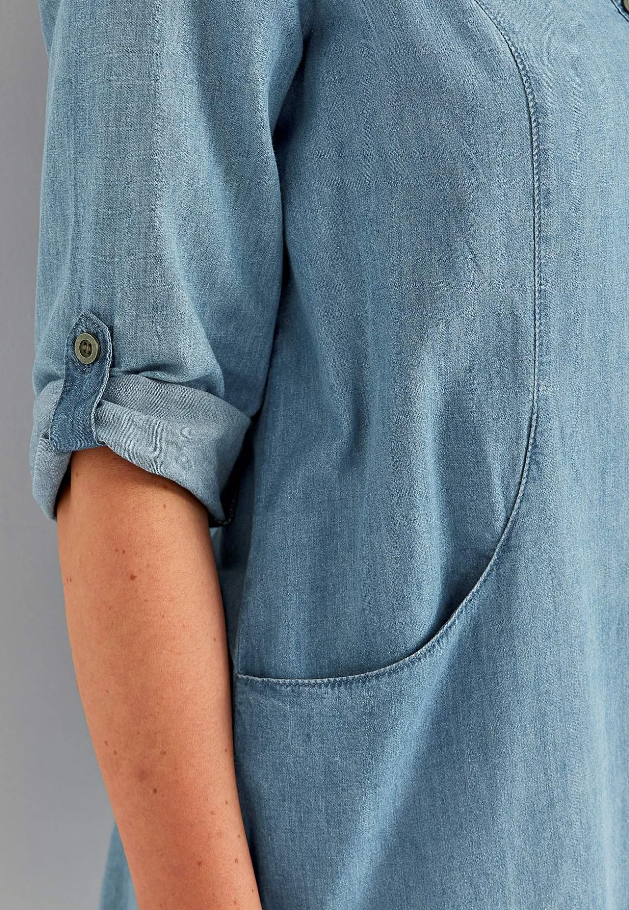 Denimtunika taskuilla