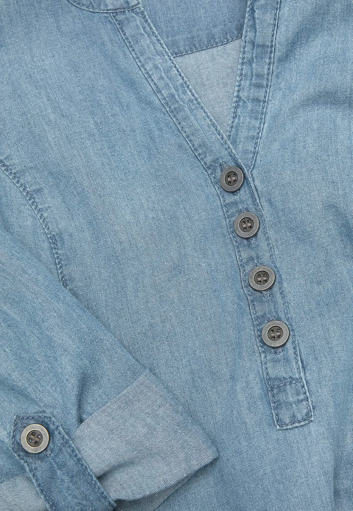 Denimtunika taskuilla
