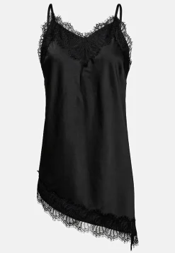 Epäsymmetrinen satiininen yläosa pitsireunuksella