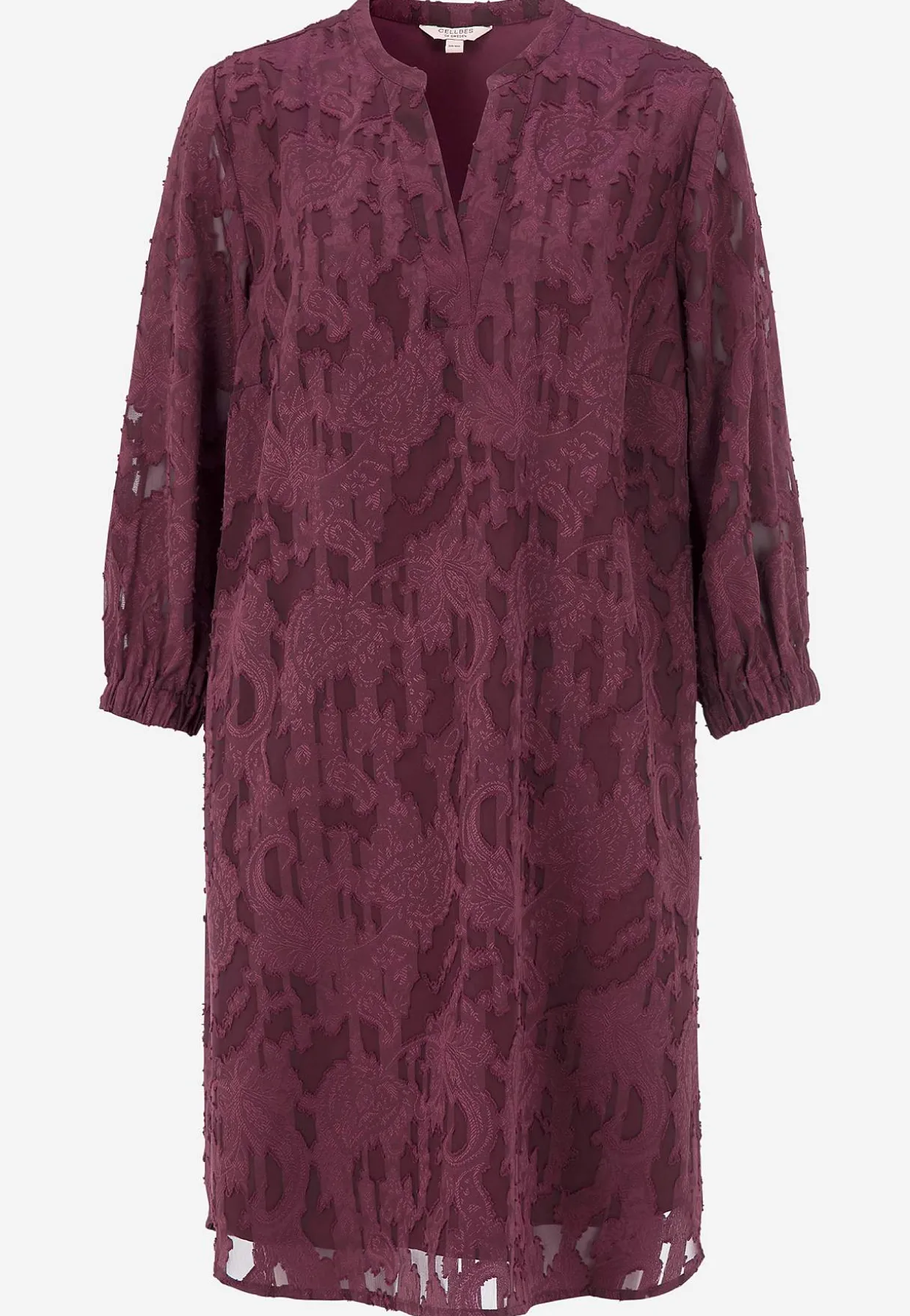 Jacquard-neuloksinen, läpikuultava mekko