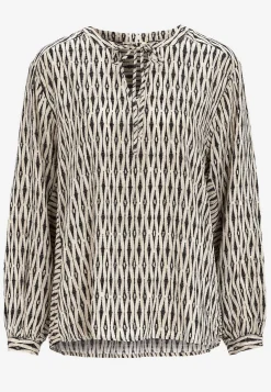 Jacquard-neuloksinen pusero
