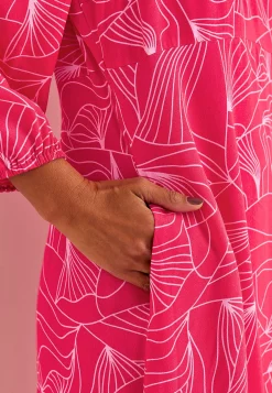 Kudottu mekko taskuilla