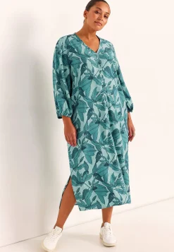 Kudottu mekko taskuilla
