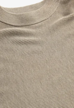 Tiheäsilmukkainen poncho
