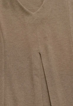 Trikootunika laskosdetaljilla