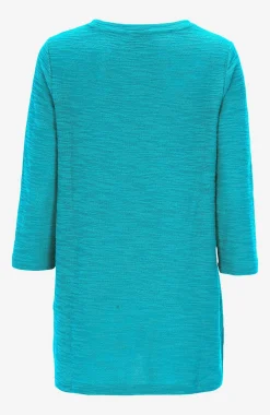 Trikootunika sommitelmalla