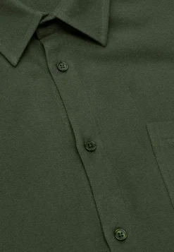 Tummanvihreä flanellipaita