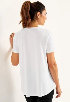 V-kaula-aukkoinen trikootoppi